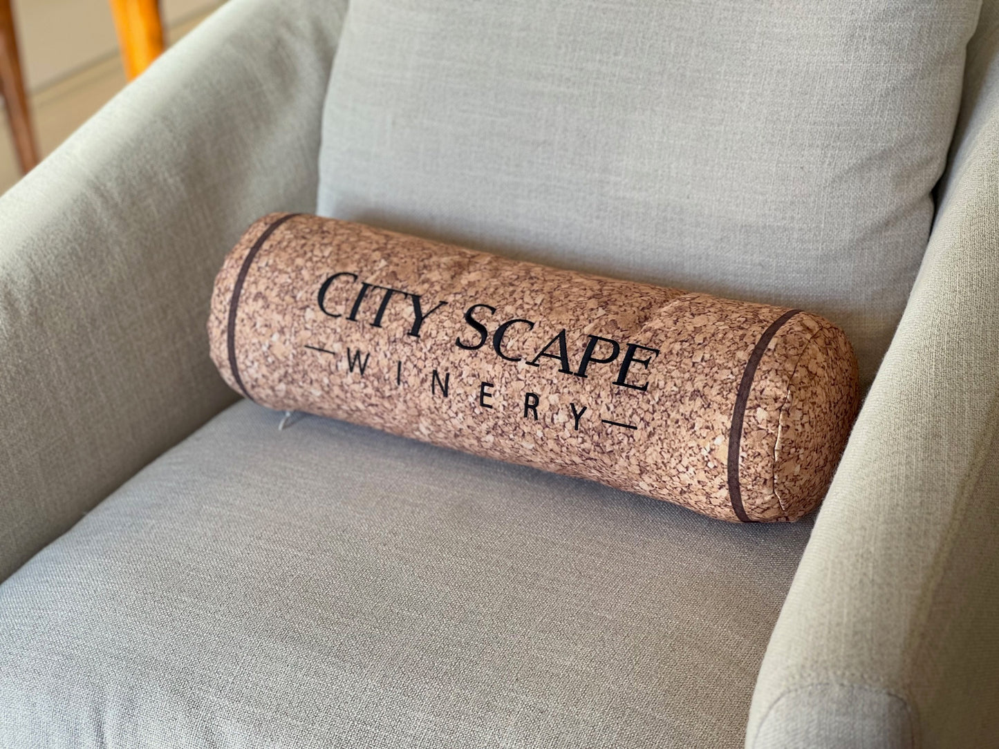 Fun quirky custom embroidery wine cork shape pillow. Great for the wine enthusiast