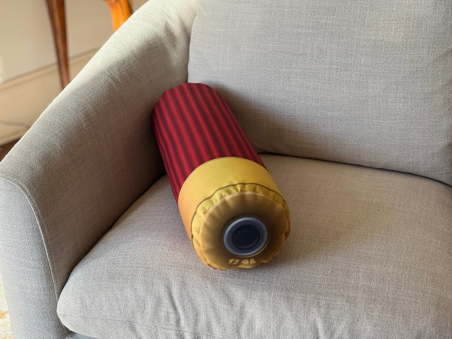 Red Shotgun shell pillow. Shaped like a real shotgun shell. Great gift for any hunter