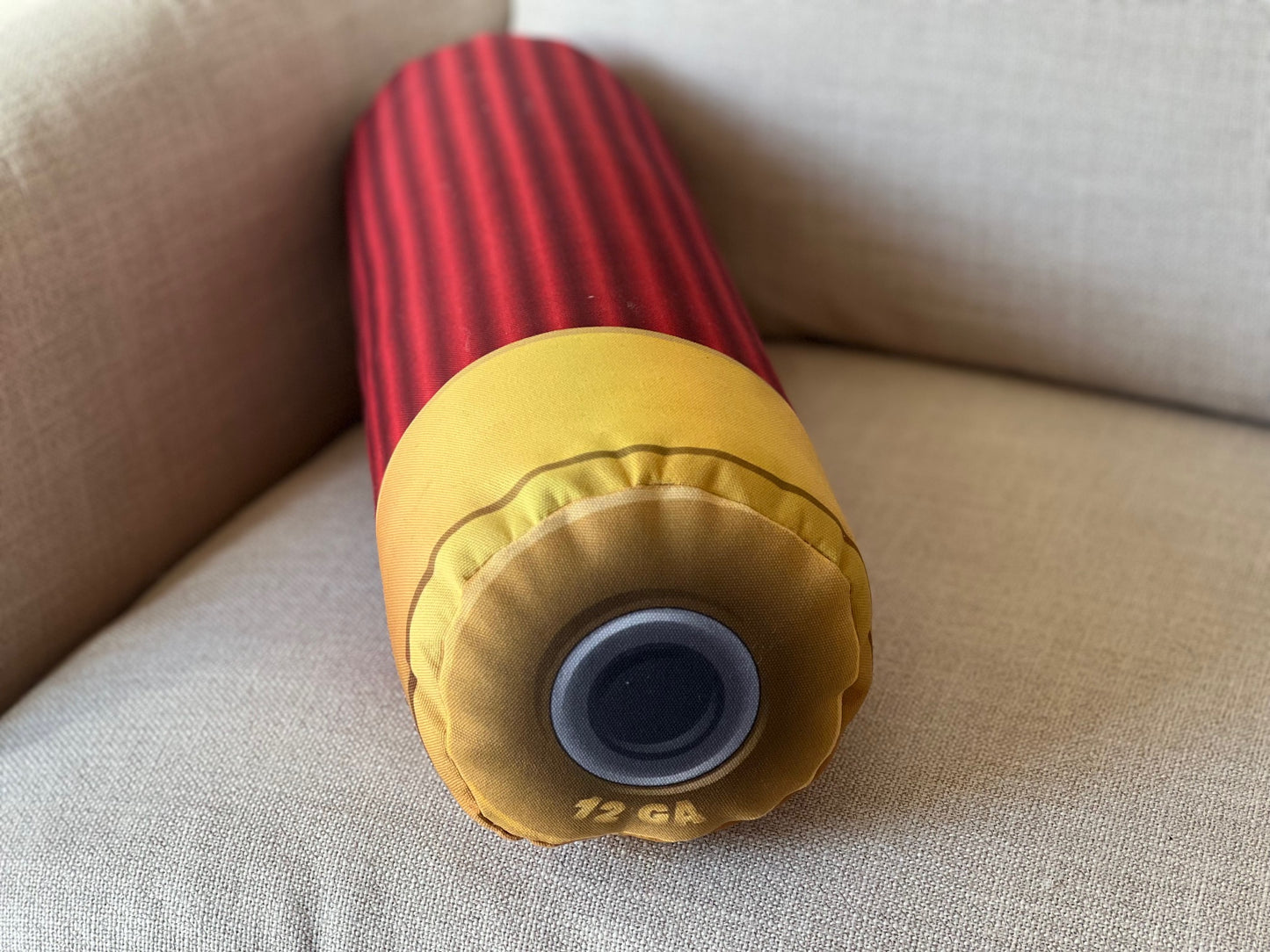 Red Shotgun shell pillow. Shaped like a real shotgun shell. Great gift for any hunter