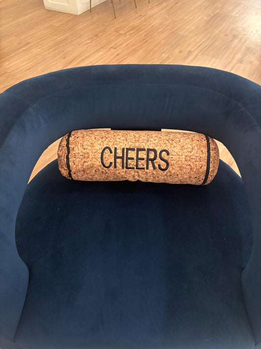 Cork shape wine cork pillow embroidered CHEERS . Also, has a zipper to easy clean and Perfect winelover gift and great decor for any room